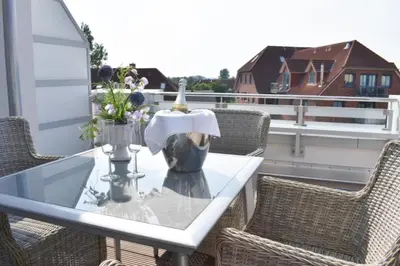 Ein Balkon oder eine Terrasse in der Unterkunft Ferienwohnung Min to Huus