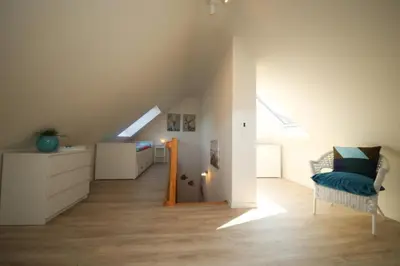 Ein Sitzbereich in der Unterkunft Ferienwohnung Min to Huus