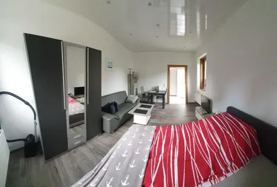 Ein Bett oder Betten in einem Zimmer der Unterkunft FeWo Tina