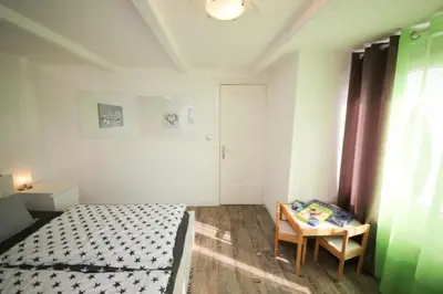 Ein Bett oder Betten in einem Zimmer der Unterkunft Ferienhaus Dünenhaus