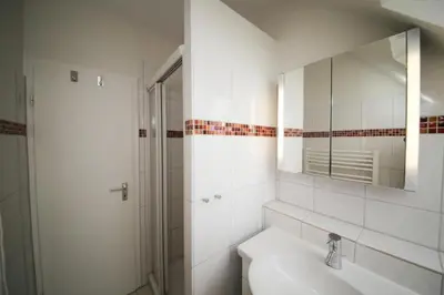 Ein Badezimmer in der Unterkunft Ferienhaus Strandräuber
