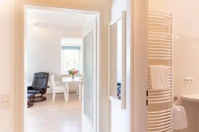 Ein Sitzbereich in der Unterkunft Ferienwohnung Ocean Drive 2