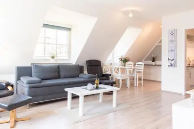 Ein Sitzbereich in der Unterkunft Ferienwohnung Ocean Drive 2