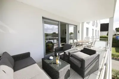 Ein Sitzbereich in der Unterkunft Ferienwohnung Traumstrand