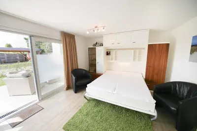 Ein Bett oder Betten in einem Zimmer der Unterkunft Ferienwohnung Traumstrand