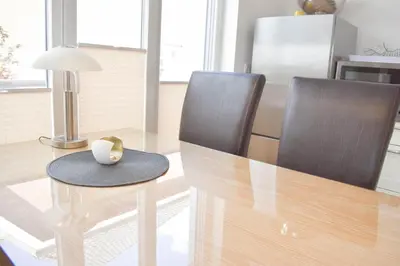 Ein Sitzbereich in der Unterkunft Ferienwohnung Traumstrand