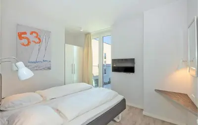 Ein Bett oder Betten in einem Zimmer der Unterkunft Passatvilla - Apartment 5
