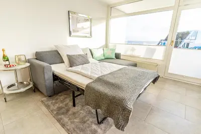 Ein Sitzbereich in der Unterkunft Scharbeutz 2- Zimmer- Luxus Apartment mit eigener Sauna