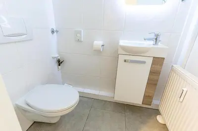 Ein Badezimmer in der Unterkunft Scharbeutz 2- Zimmer- Luxus Apartment mit eigener Sauna