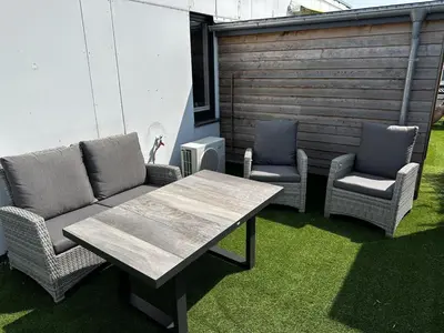 Ein Sitzbereich in der Unterkunft Scharbeutz 2- Zimmer- Luxus Apartment mit eigener Sauna