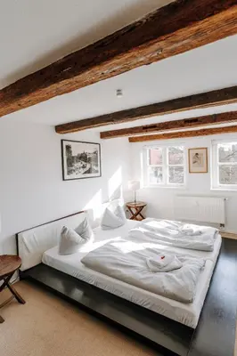 Ein Bett oder Betten in einem Zimmer der Unterkunft Apartments Fleischhauerstraße
