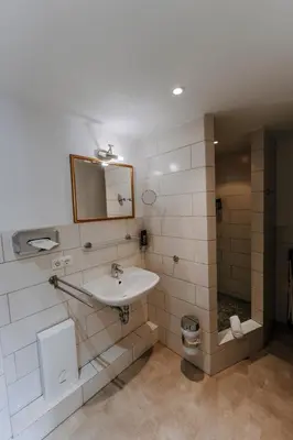 Ein Badezimmer in der Unterkunft Apartments Fleischhauerstraße