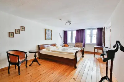 Ein Bett oder Betten in einem Zimmer der Unterkunft Apartments Fleischhauerstraße