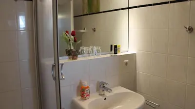 Ein Badezimmer in der Unterkunft PEMATRA Ferienwohnung Marwin
