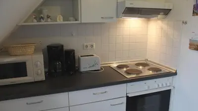 Küche/Küchenzeile in der Unterkunft PEMATRA Ferienwohnung Marwin