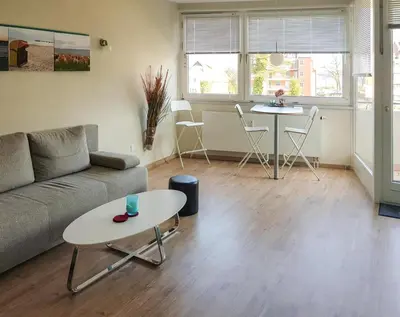 Ein Sitzbereich in der Unterkunft Ferienwohnung Beau Rivage Seaside