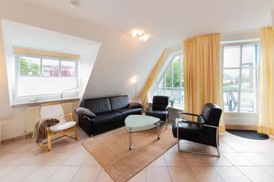 Ein Sitzbereich in der Unterkunft Ferienwohnung Ocean Drive 3