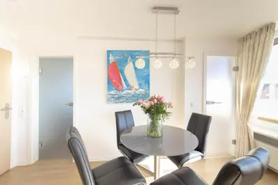Ein Sitzbereich in der Unterkunft Ferienwohnung Dreimaster