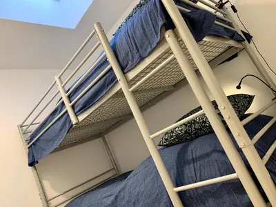 Ein Etagenbett oder Etagenbetten in einem Zimmer der Unterkunft Fischerhaus von 1680 Travemünde