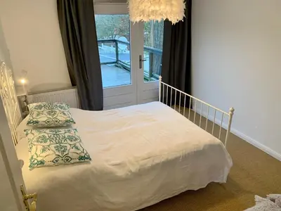 Ein Bett oder Betten in einem Zimmer der Unterkunft Fischerhaus von 1680 Travemünde