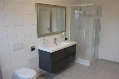 Ein Badezimmer in der Unterkunft Dünenhaus Wohnung11