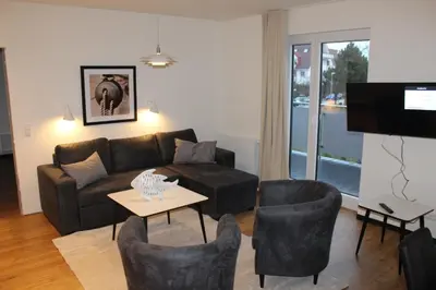 Ein Sitzbereich in der Unterkunft Dünenhaus Wohnung 7