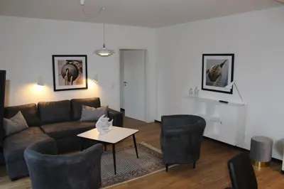 Ein Sitzbereich in der Unterkunft Dünenhaus Wohnung 8