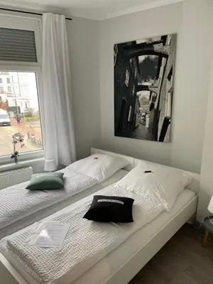 Ein Bett oder Betten in einem Zimmer der Unterkunft meierstrasse