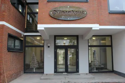 Eine Fassade oder ein Eingang zu Dünenhaus Wohnung 9
