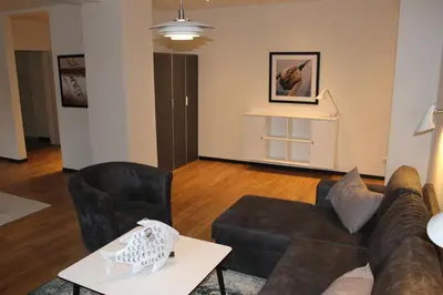 Ein Sitzbereich in der Unterkunft Dünenhaus Wohnung 9