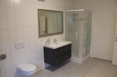 Ein Badezimmer in der Unterkunft Dünenhaus Wohnung 9