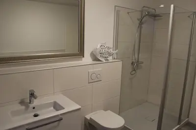 Ein Badezimmer in der Unterkunft Dünenhaus Wohnung 13