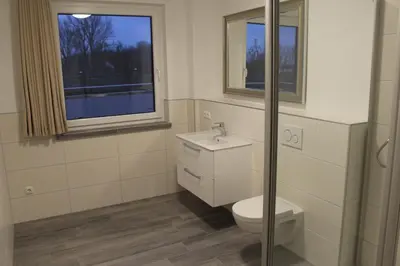Ein Badezimmer in der Unterkunft Dünenhaus Wohnung 13