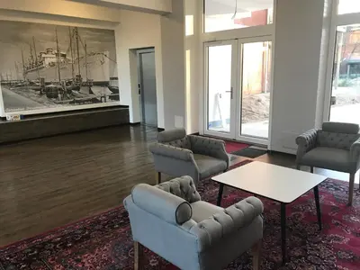 Ein Sitzbereich in der Unterkunft Dünenhaus Wohnung 13