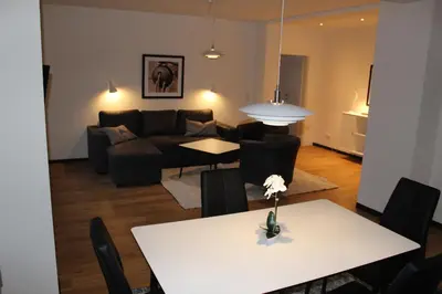 Ein Sitzbereich in der Unterkunft Dünenhaus Wohnung 6