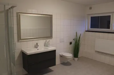 Ein Badezimmer in der Unterkunft Dünenhaus Wohnung 6