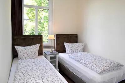 Ein Bett oder Betten in einem Zimmer der Unterkunft Villa Park Ocean