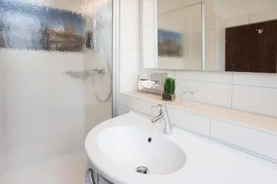 Ein Badezimmer in der Unterkunft LIHO - einfach Lübeck