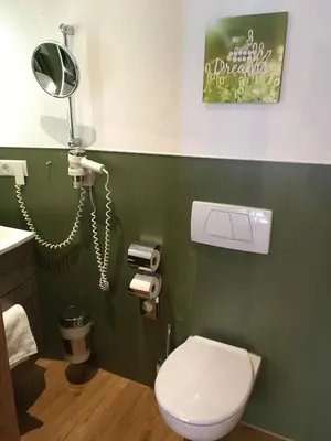 Ein Badezimmer in der Unterkunft Flair Landhotel Strengliner Mühle