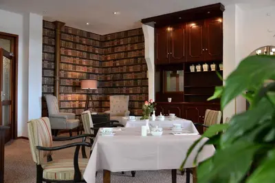 Ein Sitzbereich in der Unterkunft Arnimsruh Hotel garni
