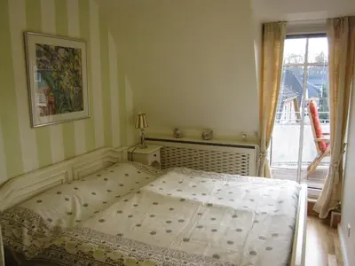 Ein Bett oder Betten in einem Zimmer der Unterkunft Residenz Weedkroog