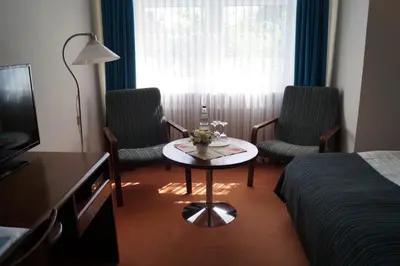 Ein Sitzbereich in der Unterkunft Hotel Forsthaus St. Hubertus