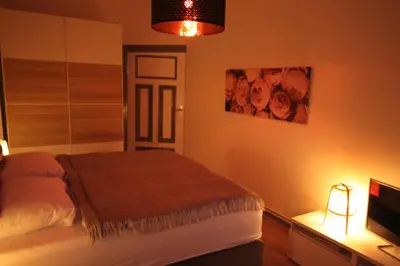 Ein Bett oder Betten in einem Zimmer der Unterkunft Royal Residence