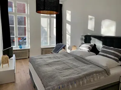 Ein Bett oder Betten in einem Zimmer der Unterkunft Royal Residence