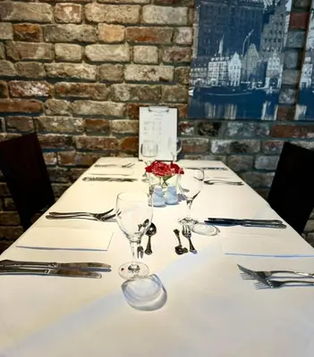 Ein Restaurant oder anderes Speiselokal in der Unterkunft TOP CityLine Klassik Altstadt Hotel Lübeck