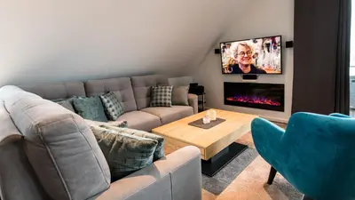 TV/Unterhaltungsangebot in der Unterkunft Ocean House Penthousewohnung Wolke 7 mit Whirlpool
