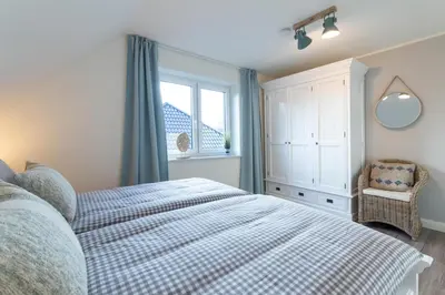 Ein Bett oder Betten in einem Zimmer der Unterkunft Ferienhaus SOUTH COAST