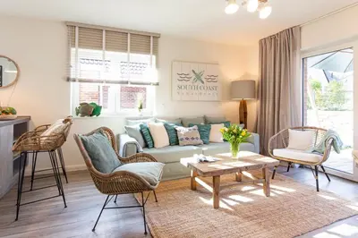 Ein Sitzbereich in der Unterkunft Ferienhaus SOUTH COAST