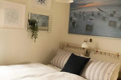 Ein Bett oder Betten in einem Zimmer der Unterkunft Lot Lodge Travemünde
