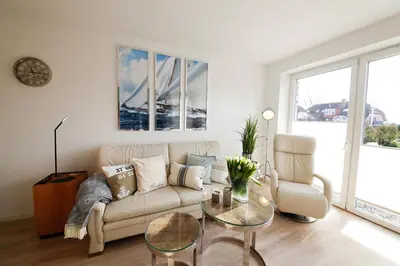 Ein Sitzbereich in der Unterkunft Ferienwohnung Ausruhen